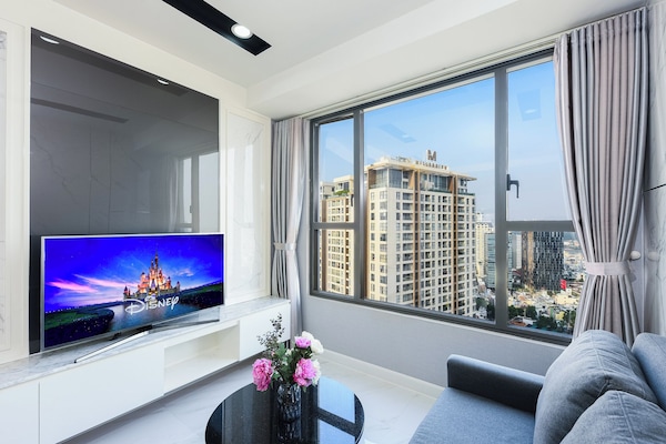 Business Apartment, 2 Bedrooms, Balcony, River View | Living area | 34-inch flat-screen TV with cable channels