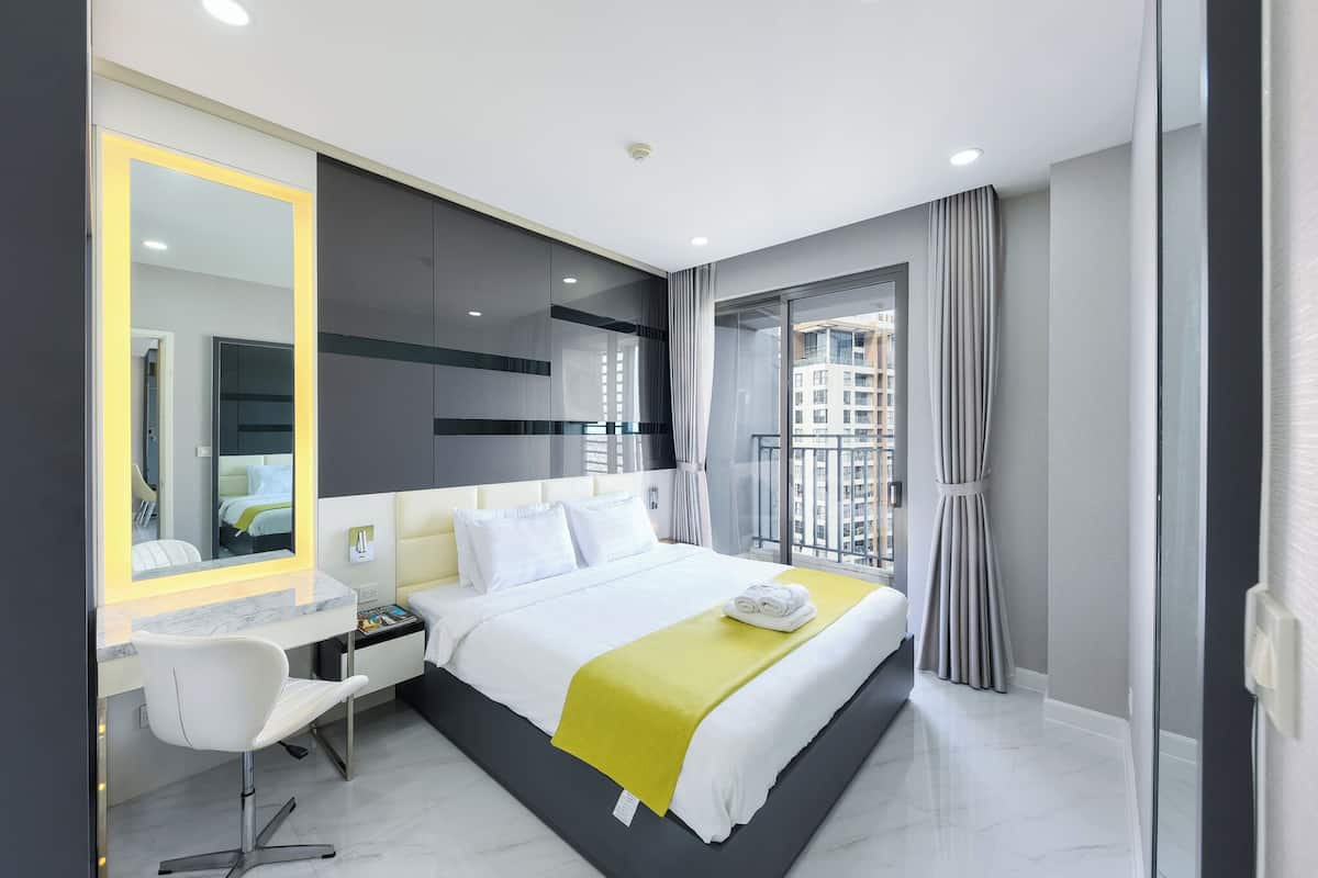 Deluxe Apartment, 2 Bedrooms, Balcony, River View | Minibar, desk, laptop workspace, blackout drapes