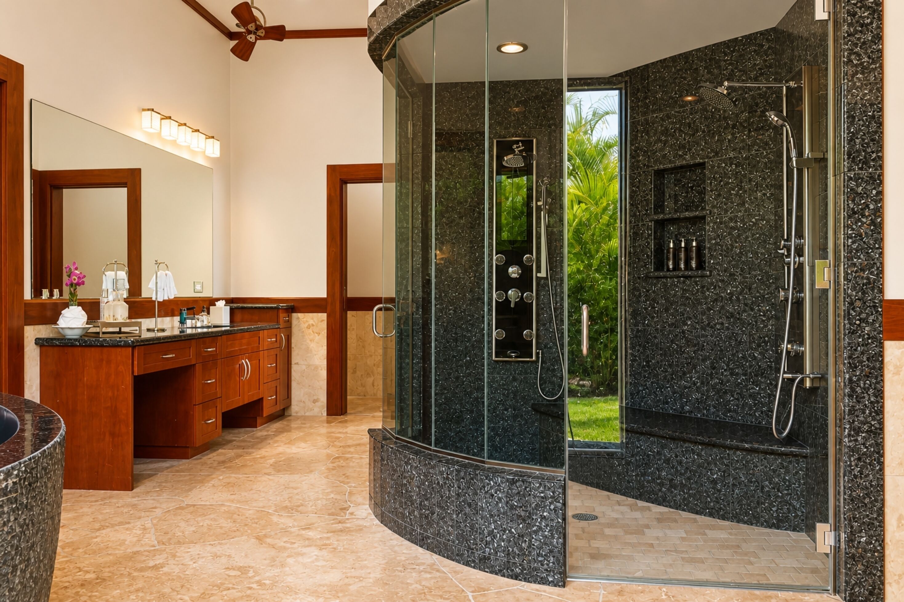 A modern bathroom with a glass-enclosed shower, a vanity with a mirror, and a sink.