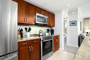 Condo (4 Bedrooms) | Private kitchen | Microwave, oven, dishwasher, coffee/tea maker