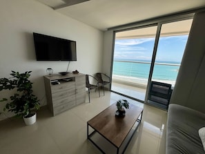 Basic Apartment, 1 Bedroom, Balcony, Beach View | Living area