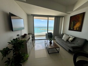 Basic Apartment, 1 Bedroom, Balcony, Beach View | Living area