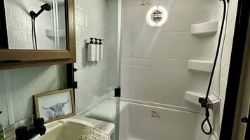 Hair dryer, towels, soap, toilet paper