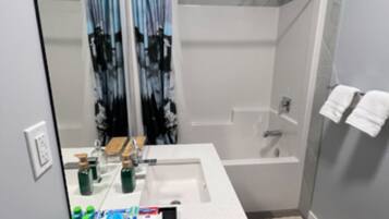 Hair dryer, towels, soap, shampoo