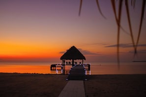On the beach, sun-loungers, beach towels