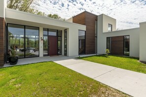 Exterior - Modern, Ultra-Luxurious, 5 BR/4.5 BA Home on a quiet wooded lake in Ann Arbor (Superior Township)