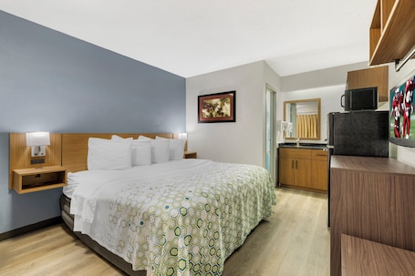 Studio, 1 King Bed, Non Smoking | Desk, laptop workspace, iron/ironing board, free WiFi. HomeTowne Studios by Red Roof Buffalo - Niagara Airport