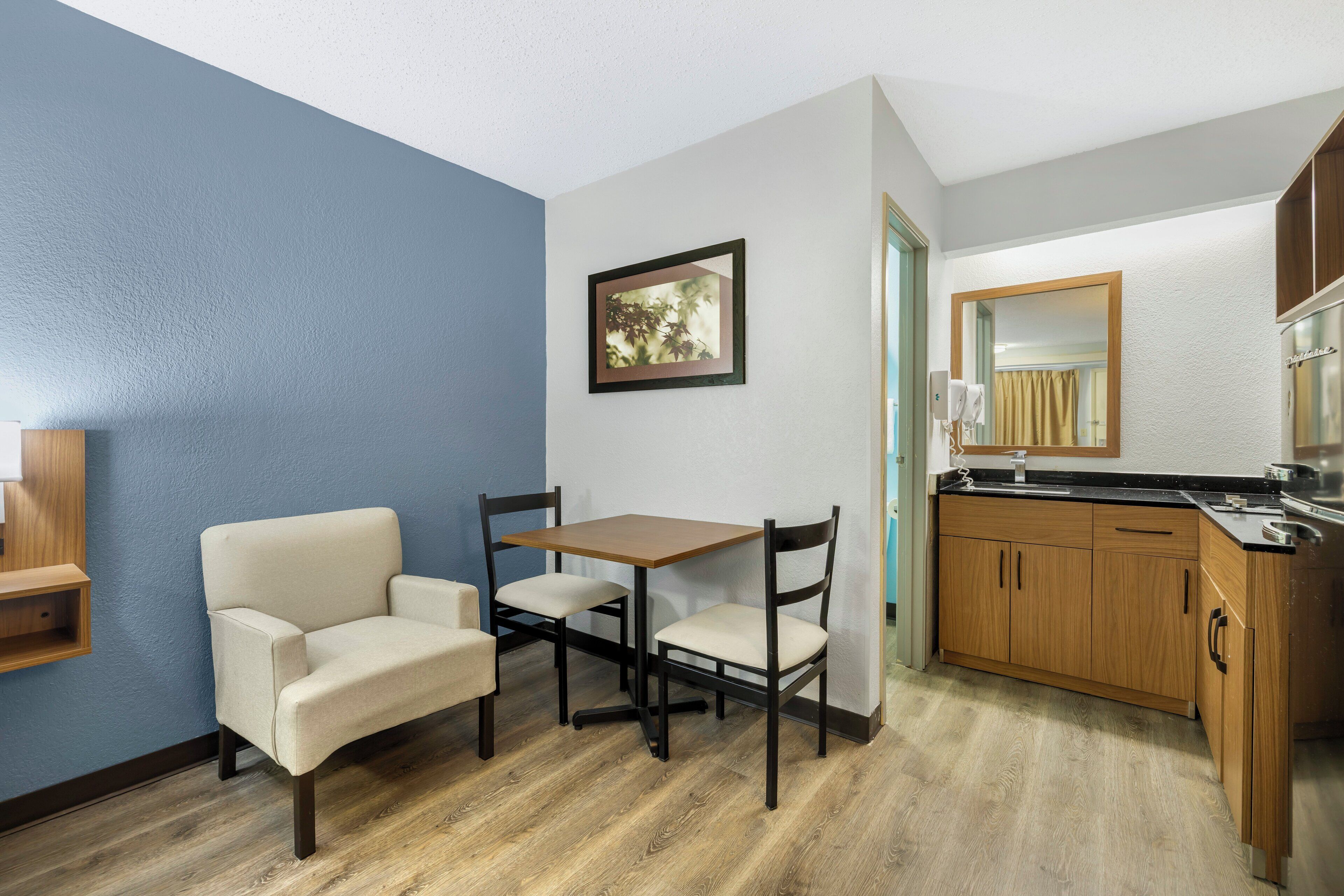 Studio, 1 King Bed, Non Smoking (Larger Room) | Private kitchenette | Full-size fridge, microwave, stovetop, eco-friendly cleaning products