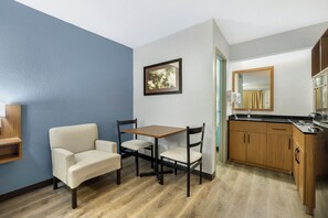 Studio, 1 King Bed, Non Smoking (Larger Room) | Private kitchenette | Full-size fridge, microwave, stovetop, eco-friendly cleaning products - HomeTowne Studios by Red Roof Buffalo - Niagara Airport (Bowmansville)