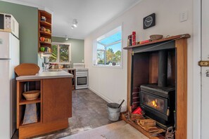 Fridge, microwave, toaster, cookware/dishes/utensils