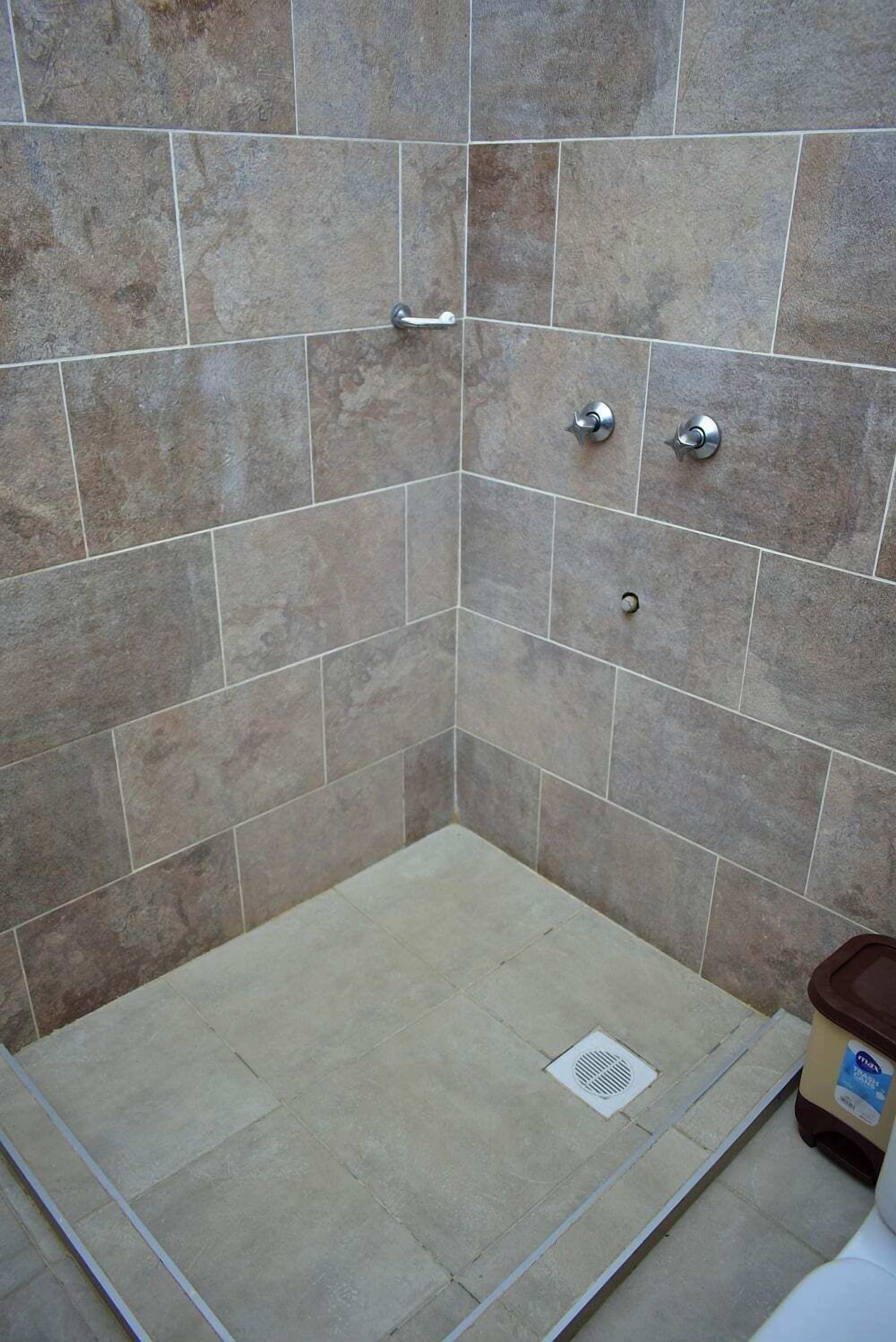 Shower, slippers, towels, soap