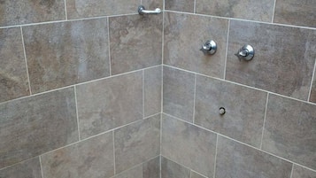 Shower, slippers, towels, soap