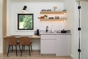 Fridge, stovetop, coffee/tea maker, cookware/dishes/utensils