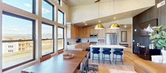 Modern condo with fireplace and private balcony - lake view