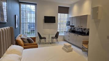 Superior Studio, 1 Double Bed, Non Smoking | In-room safe, desk, laptop workspace, iron/ironing board