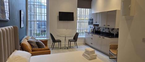 Superior Studio, 1 Double Bed, Non Smoking | In-room safe, desk, laptop workspace, iron/ironing board