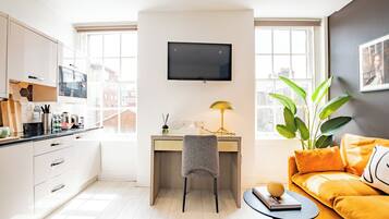 In-room safe, desk, laptop workspace, iron/ironing board