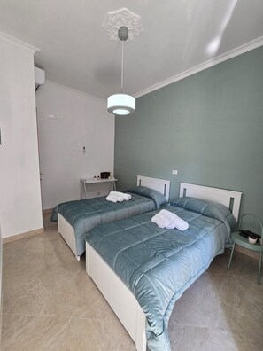 2 slaapkamers, een strijkplank/strijkijzer, wifi, beddengoed