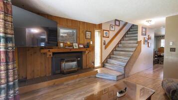 Townhome, Balcony | Living area | 65-inch Smart TV with digital channels, streaming services