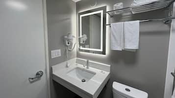 Shower, towels, toilet paper