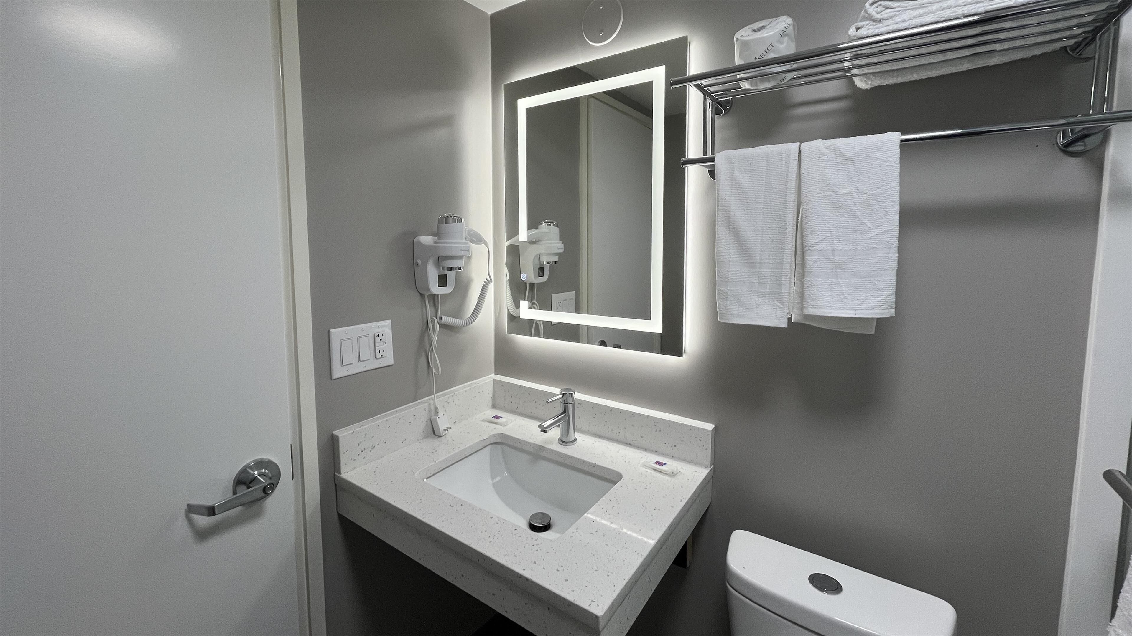 Shower, towels, toilet paper