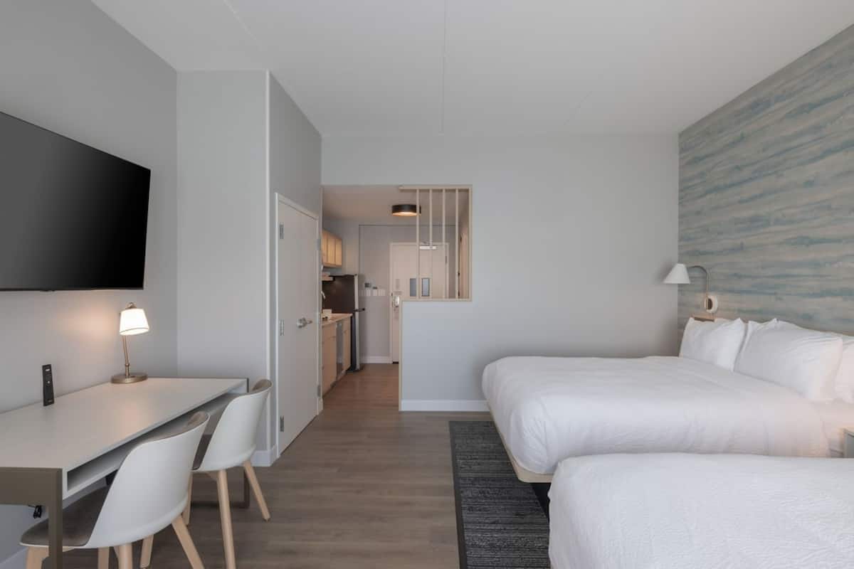 Desk, blackout curtains, free cots/infant beds, free WiFi