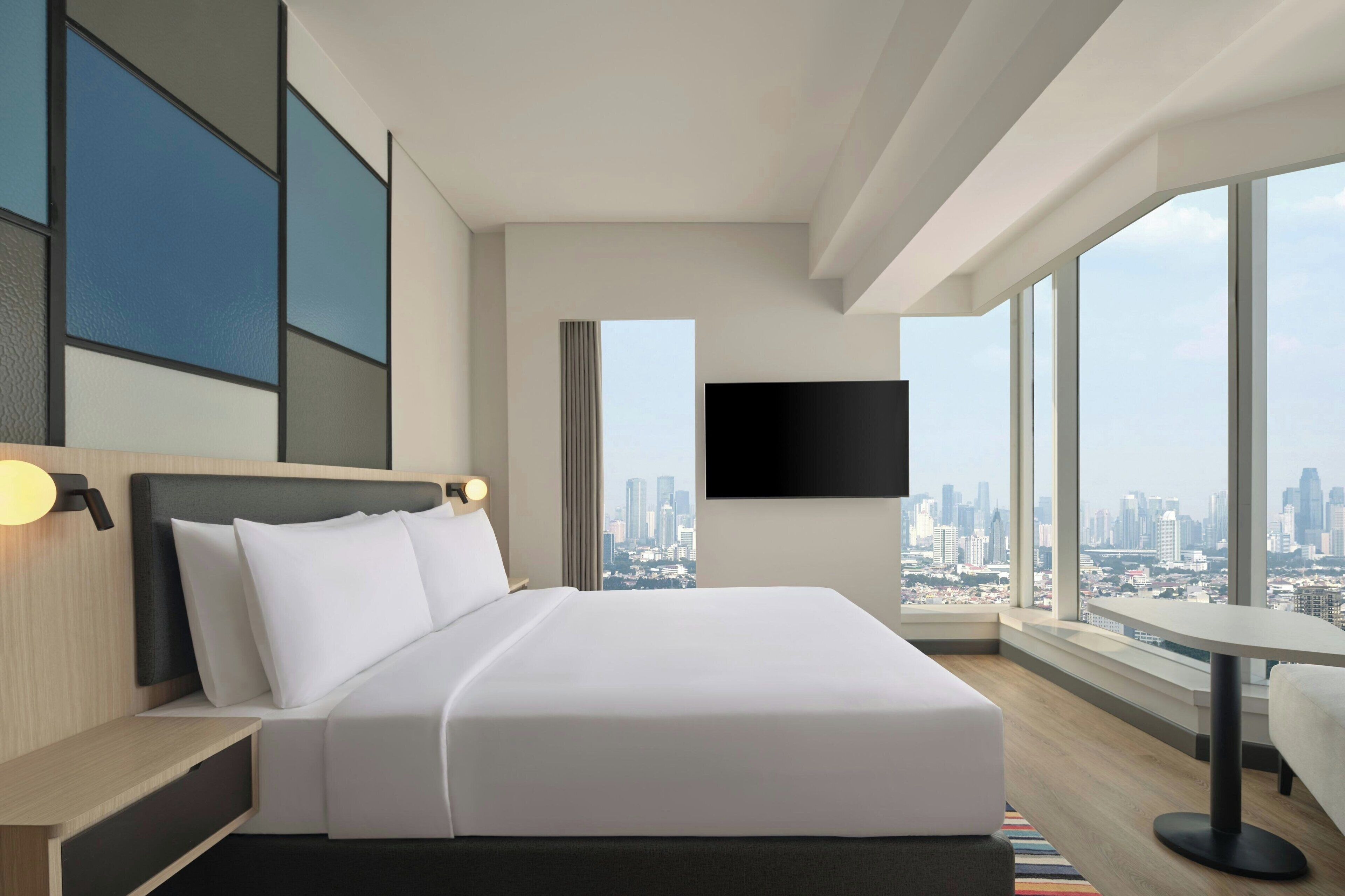 Suite, 1 habitación, vista a la ciudad (Sky) | Ropa de cama de alta calidad, edredón y minibar 