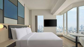 Premium bedding, down duvets, minibar, in-room safe