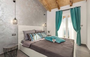 2 dormitorios, tabla de planchar con plancha, wifi y ropa de cama