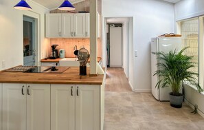 Fridge, microwave, dishwasher, coffee/tea maker