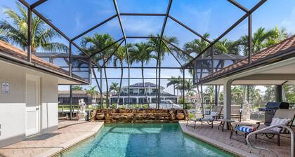 Newly Updated Villa • Heated Pool • Canal Front • Walk to Beach • 3 min drive