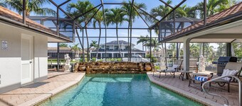 Newly Updated Villa • Heated Pool • Canal Front • Walk to Beach • 3 min drive