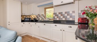 Beautiful eco-self-catering farm cottage in a peaceful valley surrounded by dramatic Lakeland scener