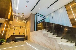 Unclassified image, 5 of 52, button - Homeinn Plus Hotel (Qingdao Weihai Road Taidong Pedestrian Street) (Qingdao)
