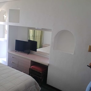 Caja de seguridad en la habitación y cortinas blackout
