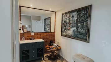 Superior Suite, 1 King Bed | Bathroom | Shower, hair dryer, towels, soap