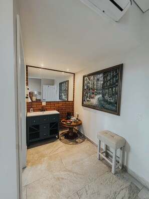 Superior Suite, 1 King Bed | Bathroom | Shower, hair dryer, towels, soap