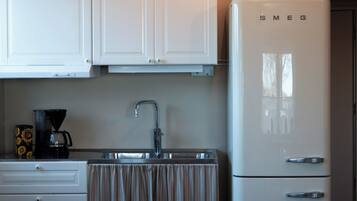 Full-size fridge, microwave, stovetop, toaster
