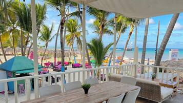 On the beach, white sand, 2 beach bars