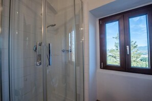Panoramic Double Room, Hill View | Bathroom | Shower, hair dryer, bidet, towels