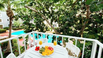 Suite, Balcony, Pool View | Terrace/patio