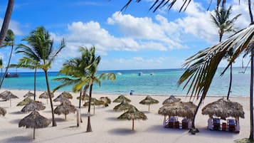 On the beach, white sand, 2 beach bars