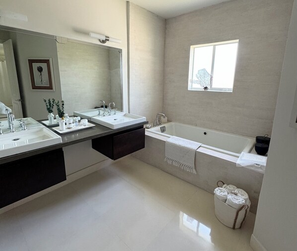 Bidet, towels, soap, toilet paper