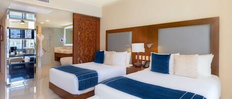 Een strijkplank/strijkijzer, beddengoed, rolstoeltoegang