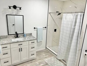 Hair dryer, towels, soap, toilet paper