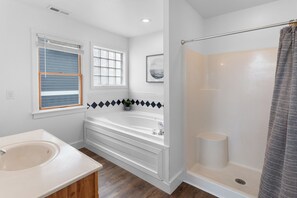 Shower, jetted tub, towels