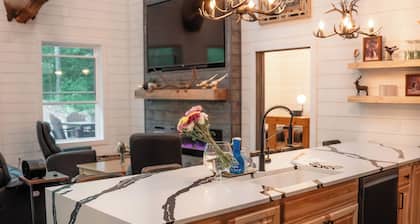 Modern mountain- inspired monoslope home located in the beautiful Northwoods