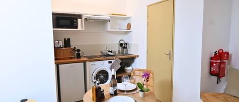 Fridge, microwave, coffee/tea maker, toaster