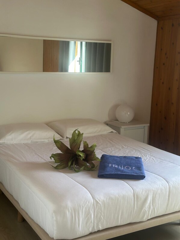 1 bedroom, desk, iron/ironing board, travel crib