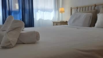 Tabla de planchar con plancha, Internet, ropa de cama